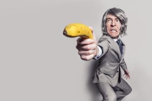 man holding banana