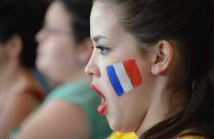 lady with painted face singing 
